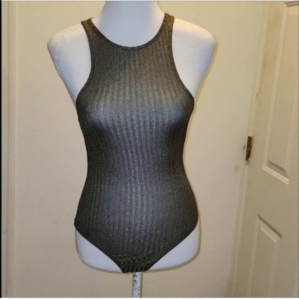 Privacy Please extra small body suit. it is very stretchy, greenish gold color